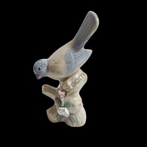 Charming Blue and Cream Bird Figurine